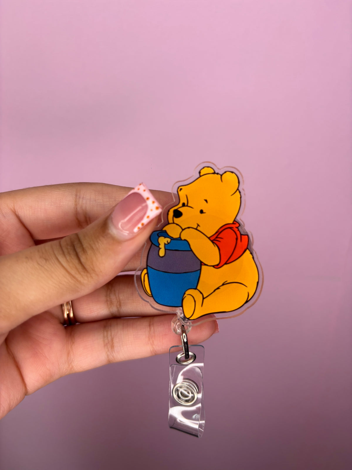 pooh bear badge reel